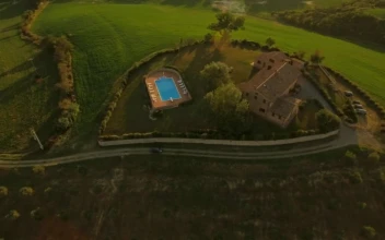 Stock Video Aerial View Of Car Driving To Italian Country Resort for PC