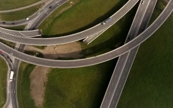 Stock Video Aerial View Of Highway Junctions With Traffic for PC