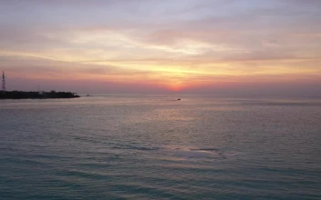 Stock Video Aerial View Of Landscape Of A Calm Sea At Sunset for PC