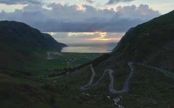 Stock Video Aerial View Of Mountain Road In Hoddevik Norway for PC