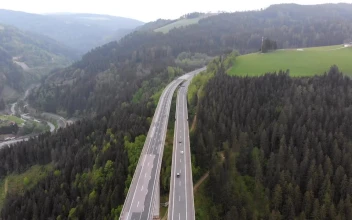 Stock Video Aerial View Of The Highway In The Mountains for PC