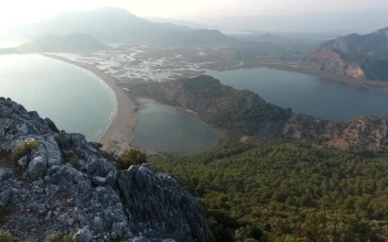 Stock Video Aerial View Of The Ocean Lakes And Mountains for PC