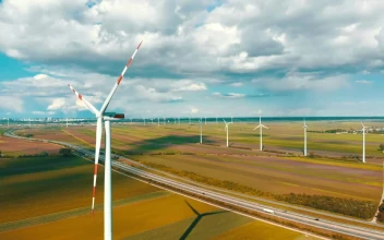 Stock Video Aerial View Of Wind Turbines In The Countryside for PC