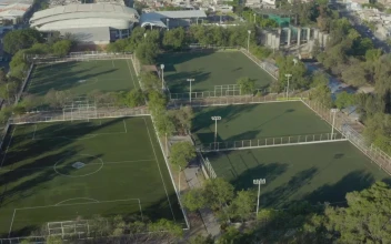 Stock Video Aerial View Over A Field With Soccer Courts for PC