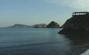 Stock Video Aerial View To The Rock Formations Of A Coast for PC