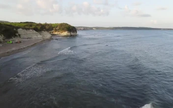 Stock Video Aerial Walk Along A Rocky Coast for PC