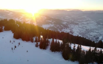 Stock Video Aerial Walk Over Snowy Mountains for PC