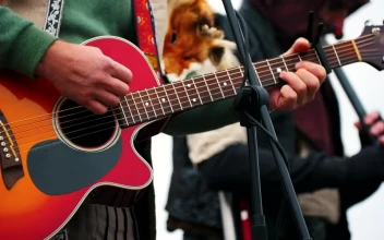 Stock Video A Band Playing Musical Instruments On Stage for PC
