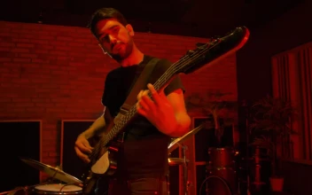 Stock Video Bass Player Playing On A Red Lit Spot For PC