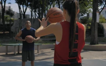 Stock Video Basketball Players Warming Up For PC