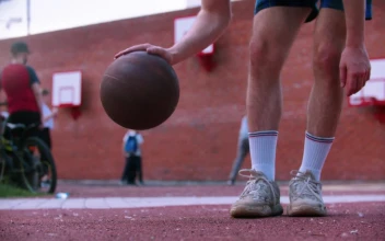 Stock Video Basketball Player Dribbling The Ball Near The Camera For PC