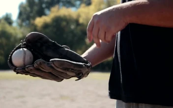 Stock Video Baseball Player Tossing The Ball Into The Glove For PC