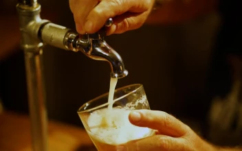 Stock Video Bartender Serving Beer From A Tap In A Glass In For PC