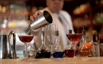 Stock Video Barmaid Preparing A Cocktail In The Bar For PC