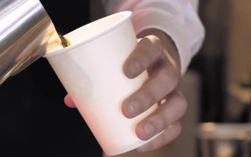 Stock Video Barista Serving Coffee In A Glass For PC
