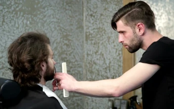 Stock Video Barber Trimming A Beard For PC