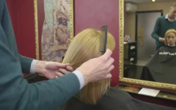 Stock Video Barber Combing Blonde Hair For PC