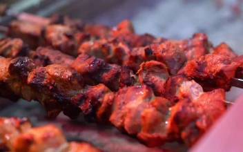 Stock Video Barbecue Rotating On The Grill For PC