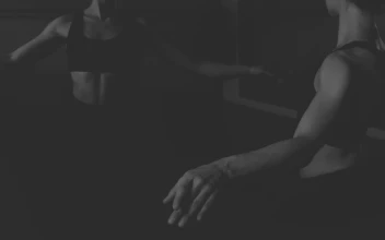 Stock Video Ballet Dancer Warming Up In Front Of A Mirror For PC