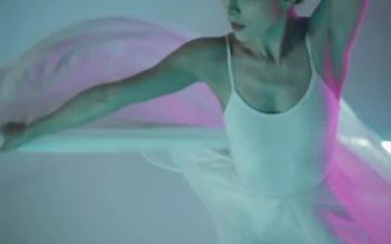 Stock Video Ballet Dancer Dancing Flamboyantly Under Colored Lights For PC