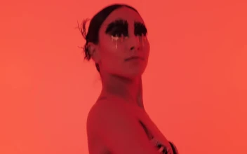 Stock Video Ballet Dancer Dancing Artistically Under A Red Light For PC