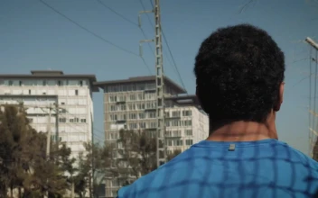 Stock Video Back View Of Man Running Down Street For PC