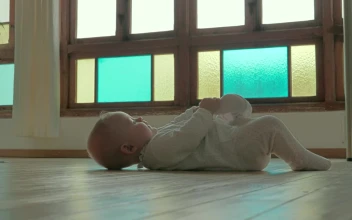 Stock Video Baby Holding Their Foot For PC