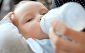Stock Video Baby Drinking Form The Milk Bottle For PC