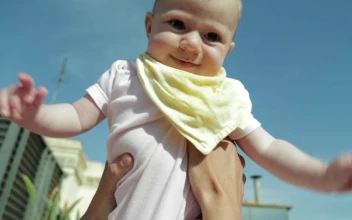 Stock Video Baby Being Held In The Air For PC