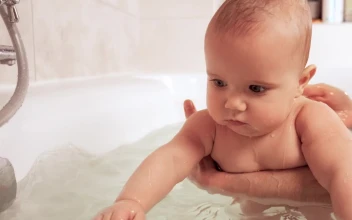 Stock Video Baby Being Bathed In The Tub For PC