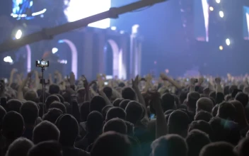 Stock Video Audience Waving Their Hands For PC