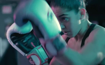 Stock Video Athletic Woman Training With A Punching Bag For PC