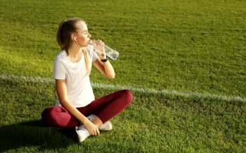 Stock Video Athlete Woman Drinking Water And Resting For PC