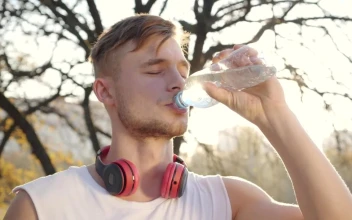 Stock Video Athlete Man Drinking Water In His Training For PC