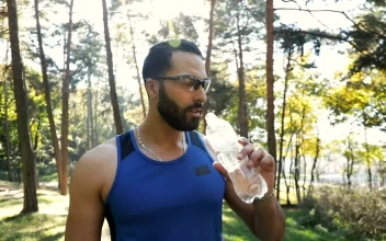 Stock Video Athlete Man Drinking Water During His Training For PC