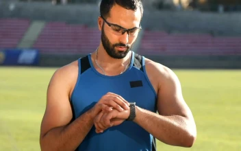 Stock Video Athlete Checks Timer Before Run For PC