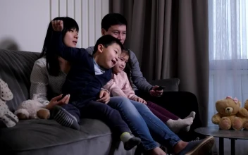 Stock Video Asian Family Enjoying A Tv Show For PC
