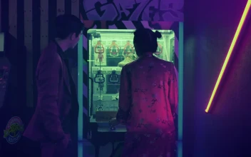 Stock Video Asian Couple Playing With An Arcade Toy Machine For PC