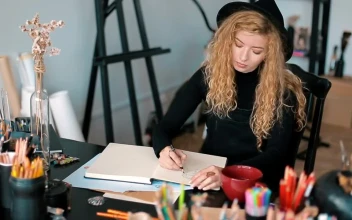Stock Video Artist Thinking And Sketching Sips Cup Of Tea For PC
