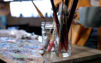 Stock Video Artist Placing A Cup Down In Their Studio For PC