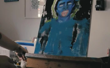 Stock Video Artist Painting An Abstract Portrait For PC