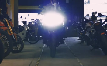 Stock Video Arriving At A Workshop Full Of Motorcycles For PC