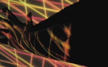 Stock Video Arm Of A Person With An Image Projected On It For PC