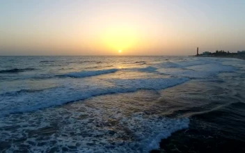 Stock Video Ariel Flight Above The Ocean In The Sunset For PC