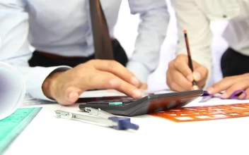 Stock Video Architects Working With A Calculator In A Desk For PC