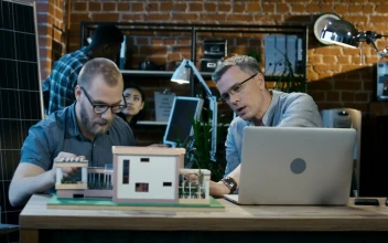 Stock Video Architects Working On A House Model In The Office For PC