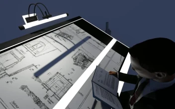 Stock Video Architect Working On A Blueprint For PC