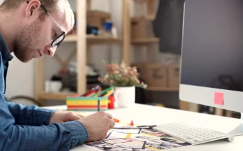 Stock Video Architect Working On A Blueprint In His Office For PC
