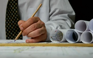 Stock Video Architect Drawing Lines On Plans For PC