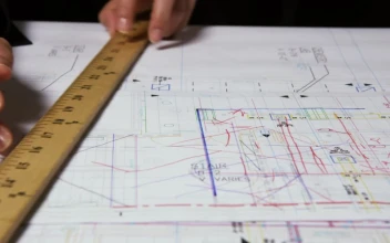 Stock Video Architect Drawing Lines On A Document For PC